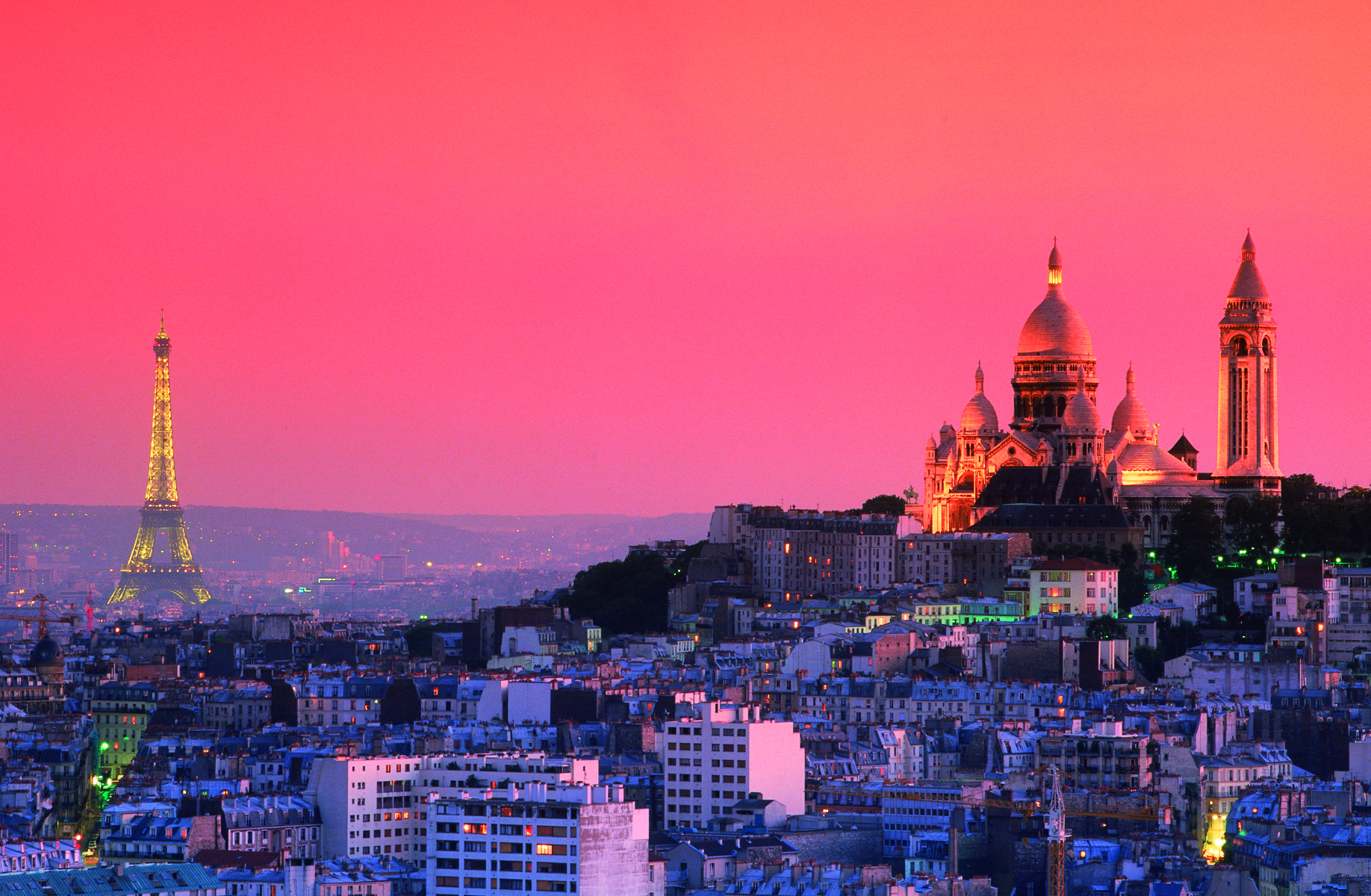 Book cover of The Paris Book, featuring the medieval Catholic cathedral Notre-Dame de Paris. Published by Monaco Books.