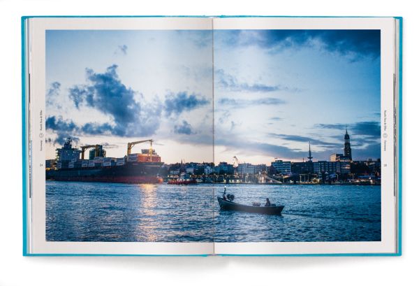 Four fish species to blue cover, 'CAPTAIN'S DINNER', in bronze font to centre of cover, by teNeues Books.