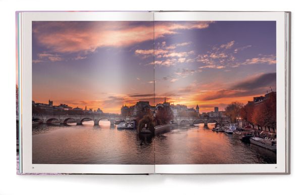 Book cover of Paris, featuring The Pont Alexandre III arch bridge over the Seine in the French city. Published by teNeues Books.