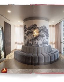 Book cover of Architecture and Design Review: The Ultimate Inspiration - From Interior to Exterior, with an interior room with large painting on wall, and modern light fittings. Published by teNeues Books.