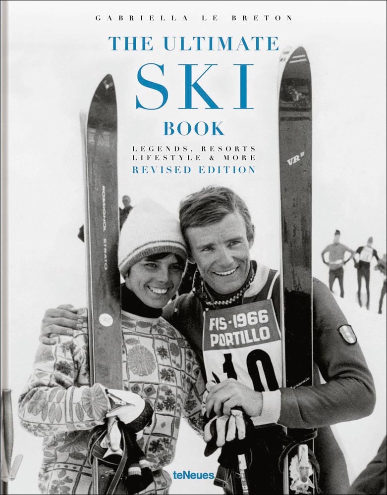 Book cover of The Ultimate Ski Book, featuring the former World Cup alpine ski racer Andreas Wenzel, with female skier. Published by teNeues Books.