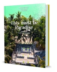 Book cover of This Must be Paradise', with an aerial view of luxury beach resort with palm trees surrounding a decked area. Published by teNeues Books.