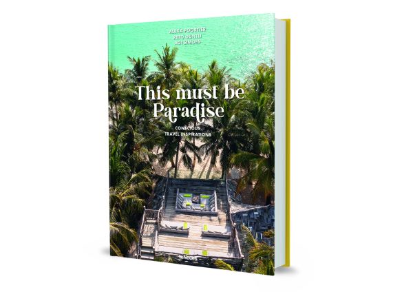 Book cover of This Must be Paradise', with an aerial view of luxury beach resort with palm trees surrounding a decked area. Published by teNeues Books.