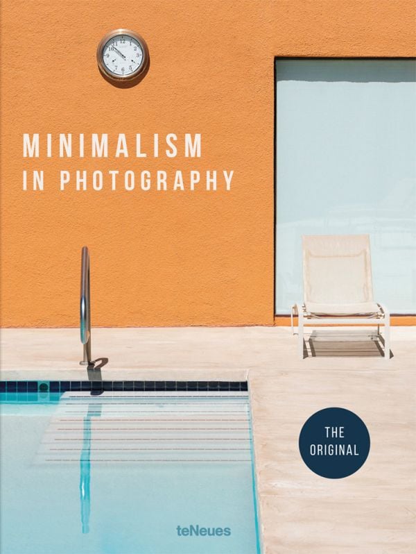 Book cover of Minimalism in Photography: The Original, with a corner of outside swimming pool, with cream deck chair, and a clock on orange wall behind. Published by teNeues Books.