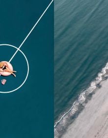 Exterior space, corner of swimming pool with cream deck chair, orange wall with clock, Minimalism in Photography in white font to upper left.