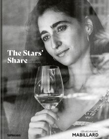 Long haired brunette woman, holding glass of wine, gazing through window, The Stars’ Share LA PART DES ÉTOILES, in white font to left of centre.