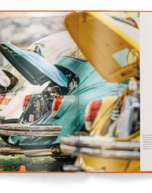 Book cover of IconiCars Volkswagen Beetle, featuring the front end of an orange Volkswagen Beetle. Published by teNeues Books.