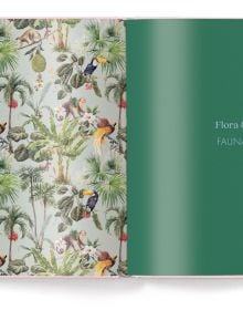 Book cover of Patterns: Patterned Home Inspiration, with white and gold patterned wallpaper, with pale pink sofa below. Published by teNeues Books.
