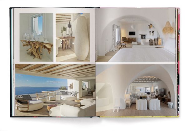 Book cover of Andrew Martin Interior Design Review Vol. 26, featuring a framed picture of Grace Jones wearing crown, with cigarette between teeth, hanging above an orange chair. Published by teNeues Books.