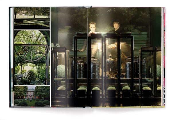 Book cover of Andrew Martin Interior Design Review Vol. 26, featuring a framed picture of Grace Jones wearing crown, with cigarette between teeth, hanging above an orange chair. Published by teNeues Books.