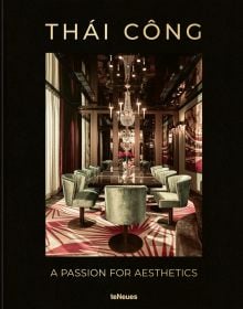 Luxurious interior with long dining table, art deco velvet chairs, chandelier above, THÁI CÔNG A PASSION FOR AESTHETICS, in gold font to top and bottom edge of black cover.