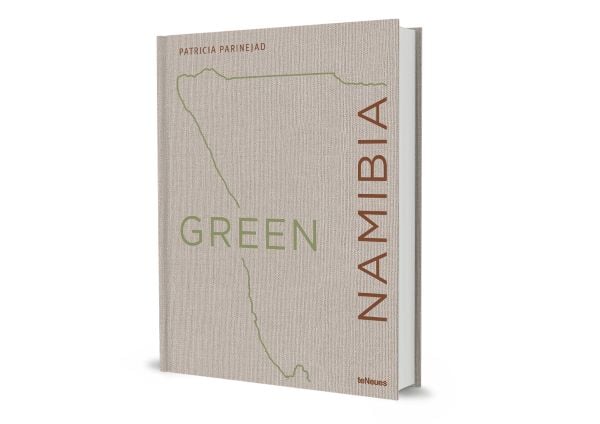 Book cover of Green Namibia, with outline of Namibian coastline. Published by teNeues Books.