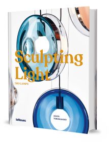 Book cover of Sculpting Light, featuring a light fixing made of blue glass. Published teNeues Books.