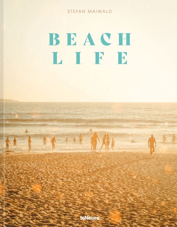 Book cover of Beachlife, with sun-goers at the beach paddling in the water, under a hazy sun. Published by teNeues Books.