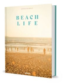 Book cover of Beachlife, with sun-goers at the beach paddling in the water, under a hazy sun. Published by teNeues Books.