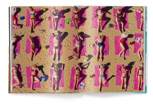 Book cover of Beachlife, with sun-goers at the beach paddling in the water, under a hazy sun. Published by teNeues Books.