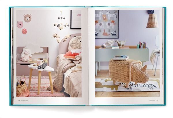 Book cover of Scandi Style, Scandinavian Home Inspiration, with a calm interior with white and grey furnishings, coffee-table, and forest outside. Published by teNeues.