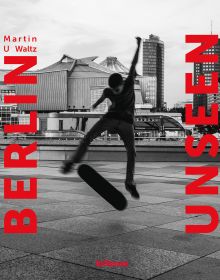 Book cover of Berlin Unseen, featuring a skateboarder performing a trick in the air, with city architecture behind. Published by teNeues Books.