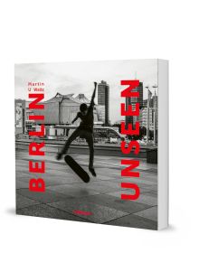 Book cover of Berlin Unseen, featuring a skateboarder performing a trick in the air, with city architecture behind. Published by teNeues Books.