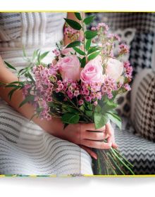 Book cover of Roses, with a single light pink rose. Published by teNeues Books.