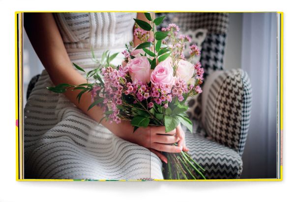 Book cover of Roses, with a single light pink rose. Published by teNeues Books.