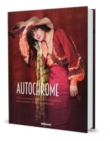 Book cover of Autochrome, The Fascination of Early Colour Photography, with woman wearing a red and orange dress, and floppy hat. Published by teNeues Books.