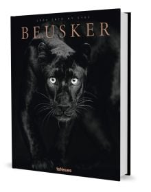 Book cover of Beusker, Look into my Eyes, with a black panther with silvery-grey eyes staring at the camera. Published by teNeues Books.