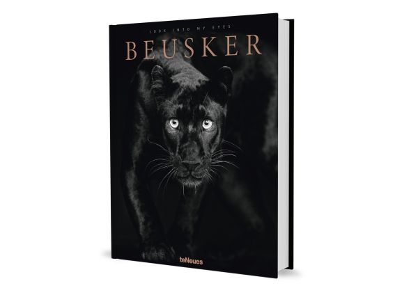 Book cover of Beusker, Look into my Eyes, with a black panther with silvery-grey eyes staring at the camera. Published by teNeues Books.