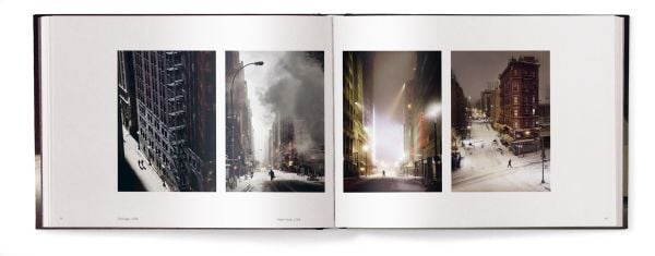 Book cover of Lost in the Beauty of Bad Weather, with a sheep walking through snowy residential street at night. Published by teNeues Books.