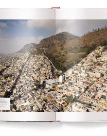 Urban city landscapes appearing through the book's title letters, on white cover of 'Megacities, Living in the World's Largest Cities', by teNeues Books.