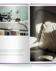 Aerial view of wood floor with woven rug, wooden plate with green palm leaf, on purple cover of 'Eco Materials, Decorating with Ecological Materials', by teNeues Books.