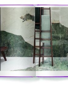 Aerial view of wood floor with woven rug, wooden plate with green palm leaf, on purple cover of 'Eco Materials, Decorating with Ecological Materials', by teNeues Books.