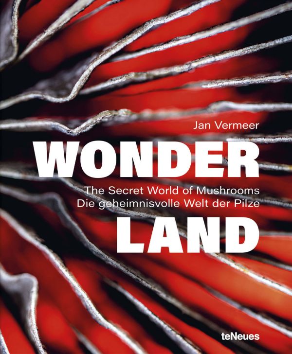 Book cover of Wonderland: The Secret World of Mushrooms, with close-up of mushroom ridges. Published by teNeues Books.