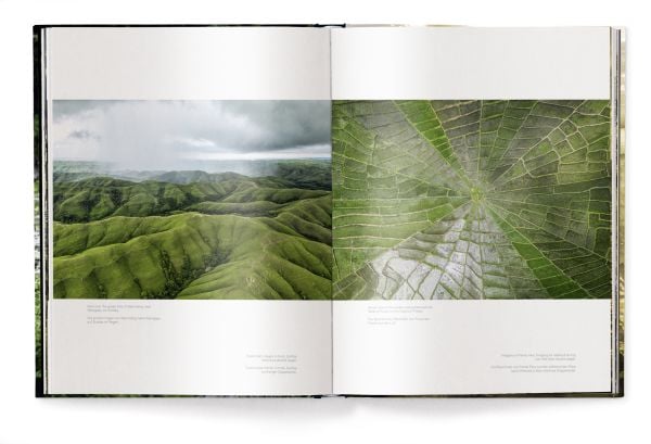 Book cover of Manolo Ty's Tropics & Traditions: Tales of Indonesia, with a young child walking through a river. Published by teNeues Books.