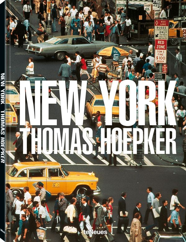 Aerial view of busy New York street with people crossing the road, and yellow taxis, on cover of Thomas Hoepker's photobook. Published by teNeues Books.