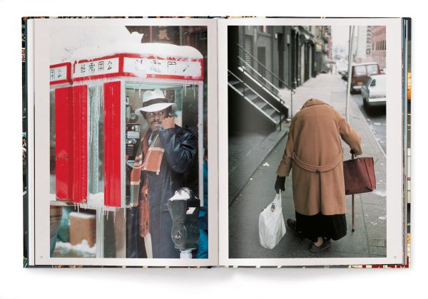 Aerial view of busy New York street with people crossing the road, and yellow taxis, on cover of Thomas Hoepker's photobook. Published by teNeues Books.