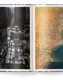 Aerial view of busy New York street with people crossing the road, and yellow taxis, on cover of Thomas Hoepker's photobook. Published by teNeues Books.