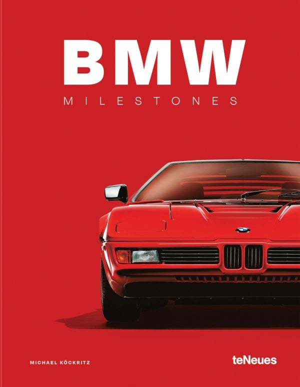Book cover of Michael Köckritz's guide BMW Milestones, featuring the front of a red BMW M1. Published by White Star.