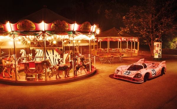 Book cover of Michael Köckritz's The Porsche Book, with a light blue Porsche 911 S-T 2024. Published by teNeues Books.