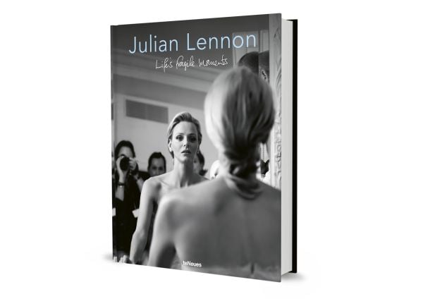 Book cover of Life's Fragile Moments: Julian Lennon, with Princess Charlene facing a mirror in her wedding dress. Published by teNeues Books.