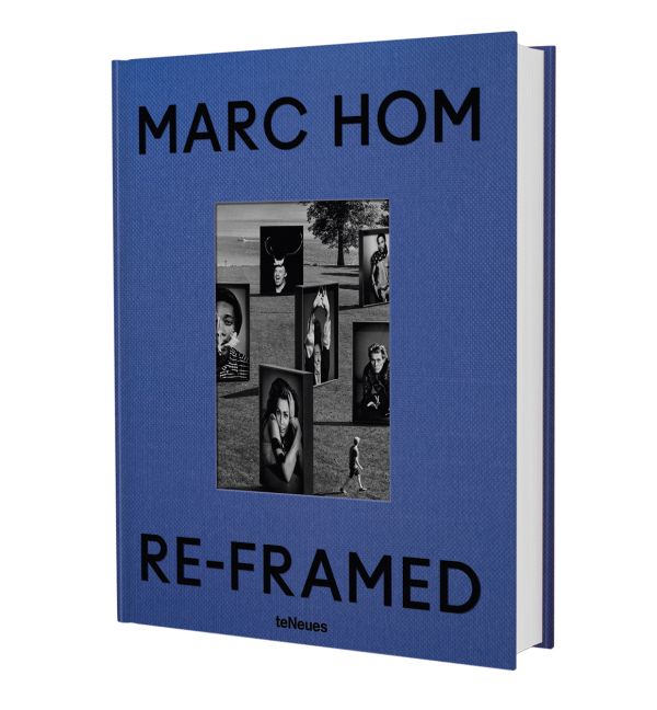 Book cover of Re-framed: Marc Hom, with large photographic prints standing in a field. Published by teNeues Books.