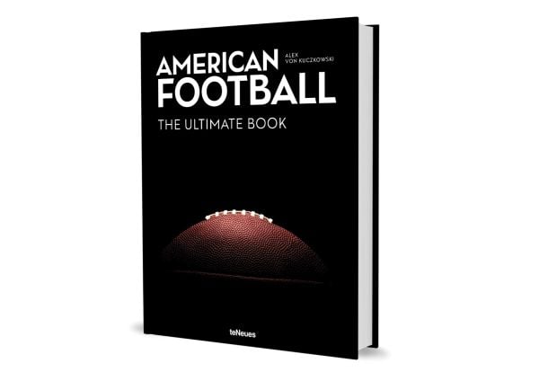 Book cover of American Football: The Ultimate Book, with a brown American football with white stitching to centre. Published by teNeues Books.