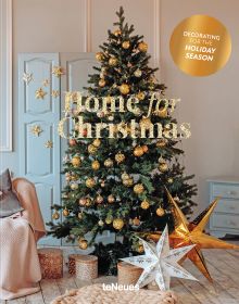Book cover of Claire Bingham's Home for Christmas, with an interior living room with wood floors and a green Christmas tree decorated with gold baubles. Published by teNeues Books.