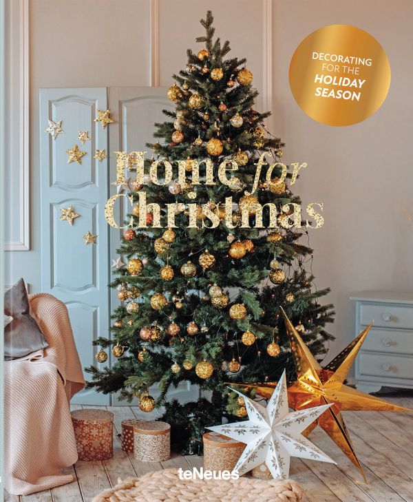 Book cover of Claire Bingham's Home for Christmas, with an interior living room with wood floors and a green Christmas tree decorated with gold baubles. Published by teNeues Books.