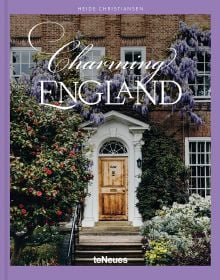 Book cover of Charming England, featuring purple wisteria hanging above a wood door. Published by teNeues Books.