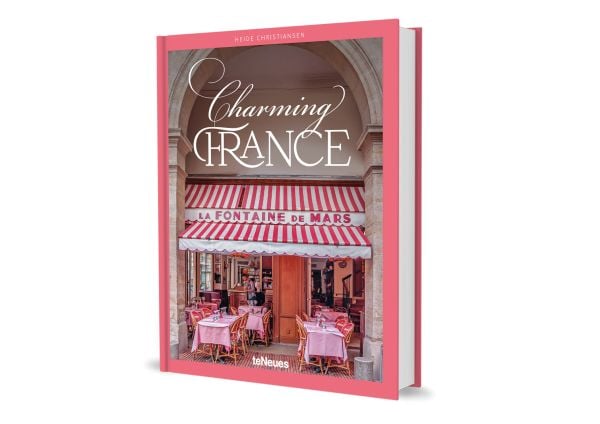Book cover of Charming France, featuring French restaurant La Fontaine de Mars. Published by teNeues Books.