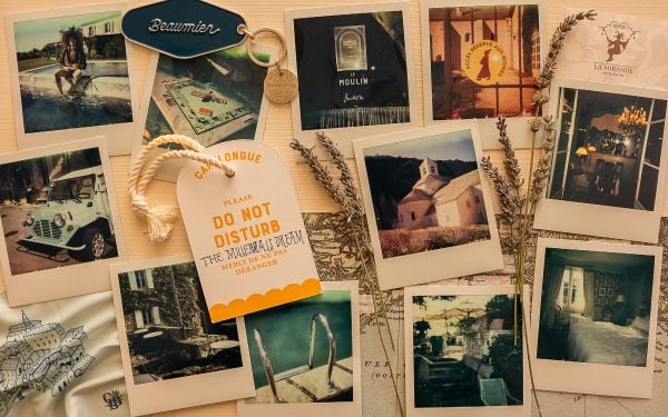 Book cover of Grand Tour Provence: The Renaissance of Refined Travel; featuring a swimmer ready to dive off a board into the sea. Published by teNeues Books.