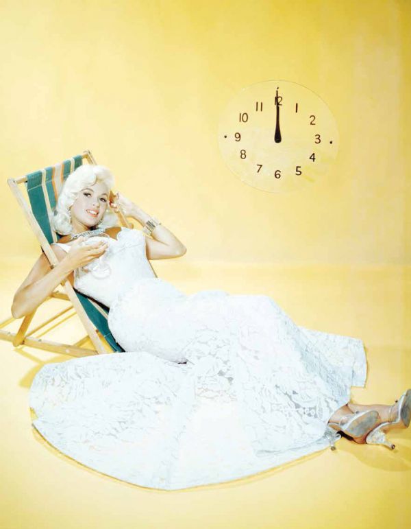 Book cover of The Stylish Life: Cocktail Parties, with four people at a 1970s pool party. Published by teNeues Books.