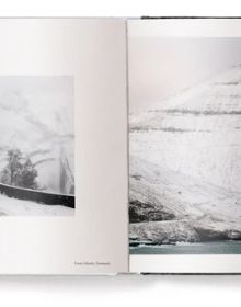 Book cover of Winterland: The Colors of Snow; featuring a snowy landscape with a house and mountain behind. Published by teNeues Books.