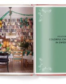 Book cover of Home for Christmas - Around the World; featuring a festive interior with a Christmas tree decorated in country flags. Published by teNeues Books.